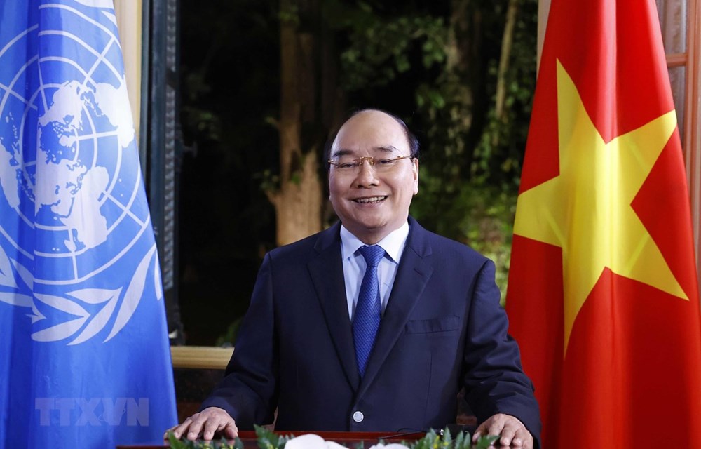 Vietnam confident, ready to shoulder international ​responsibilities for peace, sustainable development: President hinh anh 1
