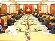 Top leaders of Vietnamese, Lao Parties meet in Hanoi