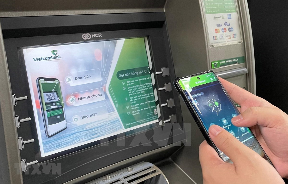 There is a heated race towards digital banking going on in Vietnam, with banking services having found their way into every corner of life. (Photo: VNA)