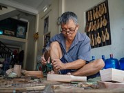 Hanoi artisan spends nearly half a century preserving craft of making moon cake moulds 
