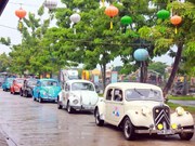 Parade of classic cars in Hoi An ancient town
