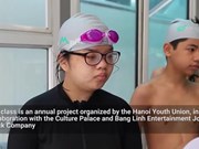 In a free swimming course for disadvantaged children in Hanoi