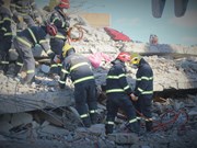Vietnamese search and rescue team finds multiple bodies in rubble in Turkey