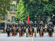 Cavalry mobile police force marches at Ba Dinh square