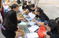 Student group recycles paper for notebooks 