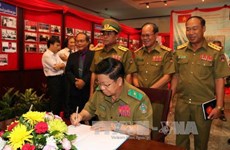  Exhibition on Laos, Vietnam police cooperation opens in Laos