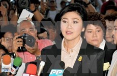 Former Thai PM appears before court for rice subsidy trial
