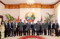 Lao leader lauds procuracy cooperation with Vietnam 