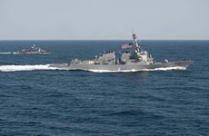 US warship sails near illegally built islands on East Sea