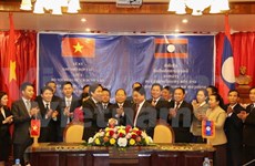 Vietnamese, Lao home affairs ministries boost cooperation 