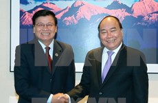 Vietnamese, Lao PMs declare to ratchet up ties 