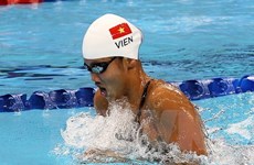 Swimmer pockets historic medal at Moscow competition