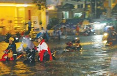 HCM City struggles to cope with record rainfall, floods