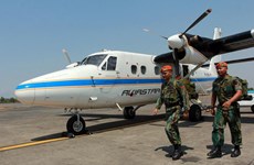 Indonesian plane crash victim bodies retrieved