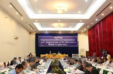 Laos review 10-year cooperation with Vietnam to develop border areas 