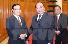  Deputy PM seeks Laos’ support to Vietnam-invested projects