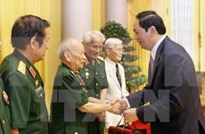 State leader hails contributions by former volunteers in Laos