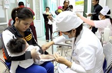 Meeting responds to immunisation week in Thanh Hoa 