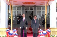 President Tran Dai Quang starts State visit to Laos 
