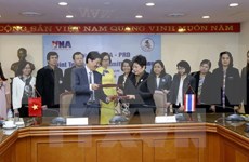 VNA, PRD sign MoU on news exchange cooperation 