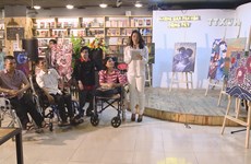 Exhibition shows disabled painters’ passion