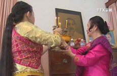 Incense keeps burning on Ho Chi Minh’s altar in Laos