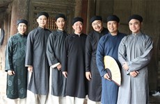 Cultural event helps revive ao dai for men