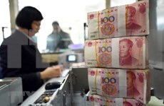 Experts explore Chinese Yuan devaluation effect on Vietnam
