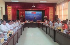 Hanoi, Vientiane improve State management in industry, trade