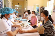 82.5% of Hanoi population receive health management services