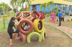 Children have fun with playgrounds from recycle materials