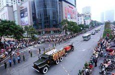 People take to street, pay last respects to President Tran Dai Quang