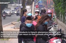 Hanoi welcomes back elementary school students after nearly a year of staying at home