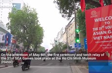 Fire ceremony and torch relay of the 31st SEA Games on the streets of Hanoi