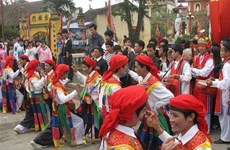 Men dress up gracefully to perform dance at village festival