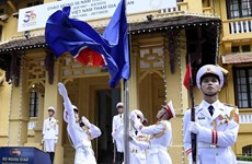 ASEAN flag-hoisting ceremony held in Hanoi