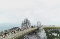 A walk on clouds at Golden Bridge on Ba Na Hills