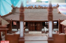 Smallest wooden miniature of communal house in Vietnam