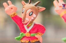 Artisan makes SEA Games mascots from jackfruit wood