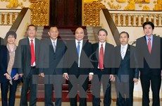 PM asks Vietnamese, Lao news agencies to foster links 