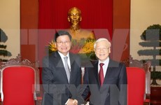 Lao PM affirms determination to boost ties with Vietnam