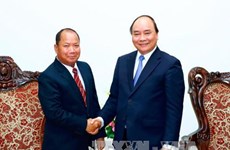 PM urges stronger VN-Laos partnership in fighting cross-border crimes