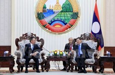 Lao Prime Minister highlights financial cooperation with Vietnam