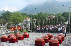 Thanh Hoa reburies martyr remains recovered from Laos