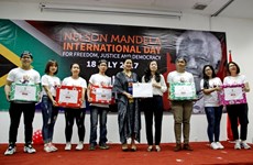 Needy children given scholarships in celebration of Nelson Mandela Day
