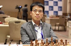 Le Quang Liem wins over world’s chess champion