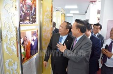Photo exhibition on Vietnam-Laos relations opens in Xiang Khouang