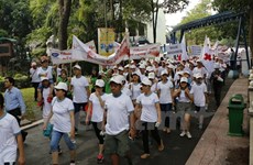 5,000 people walk for AO victims, disabled people