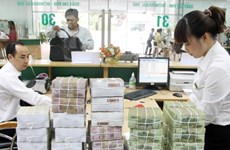 Reference exchange rate goes down by 4 VND