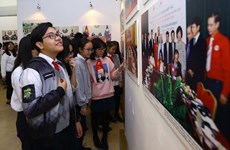 Photo exhibition on Vietnam, Laos relations opens in Hanoi